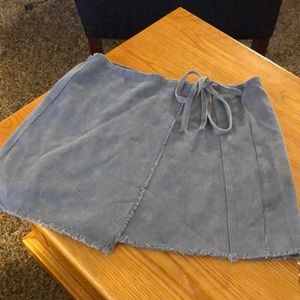 Cute little wrap around skirt, size medium, color Smokey blue. Soft denim.